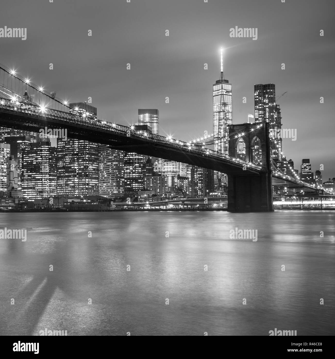 Reflection new york city manhattan bridge east river brooklyn Black and ...