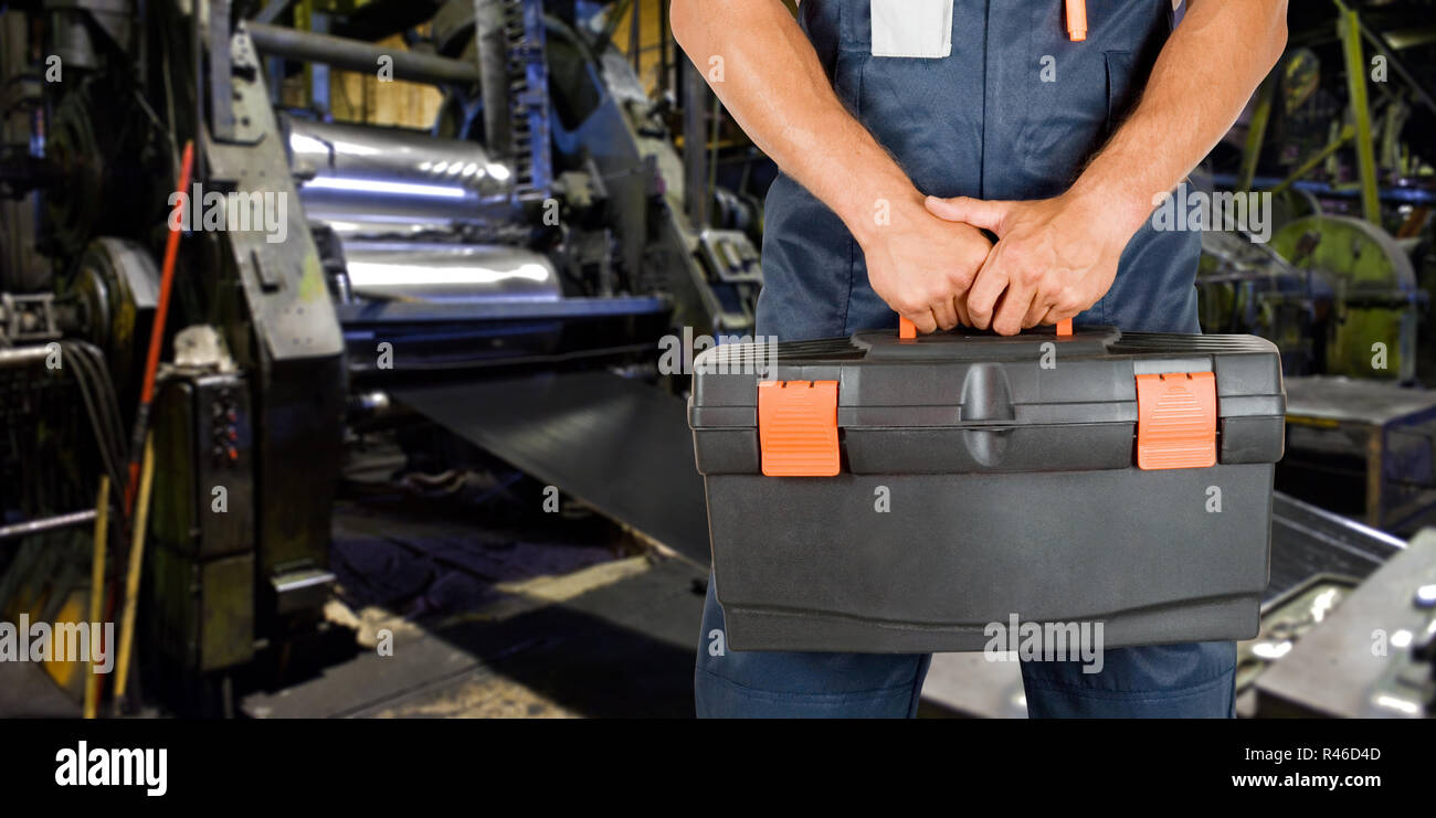 Worker with instruments Stock Photo - Alamy