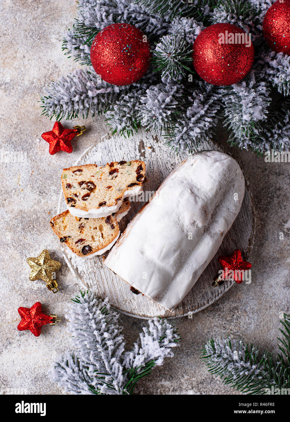 Traditional German Christmas cake stollen with dried fruits Stock Photo