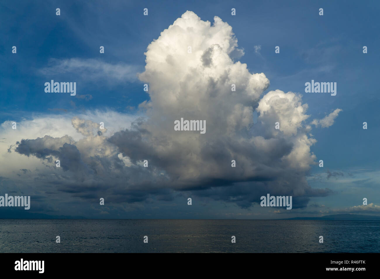 Blue sky with huge cloud hi-res stock photography and images - Alamy