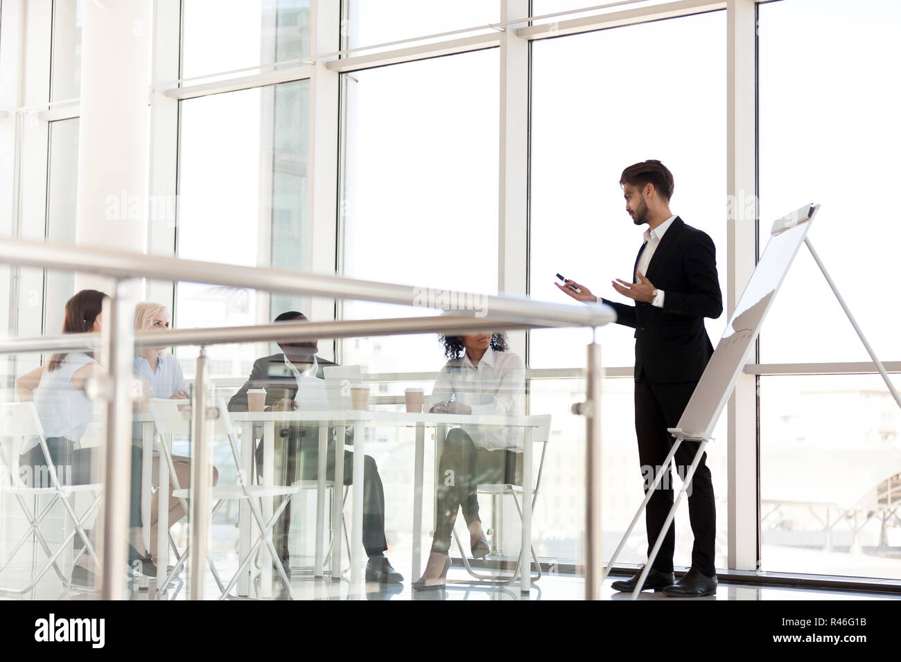 Business coach giving presentation group hi-res stock photography and ...