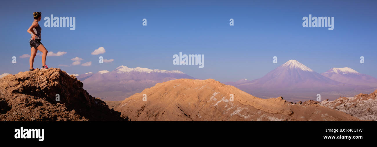 Woman enjoying the panoramic view of Atacama Desert, Chile Stock Photo