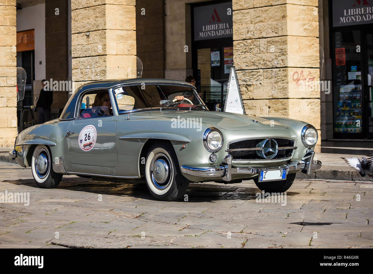 A silver 1955 built Mercedes-Benz on the road (2) Stock Photo