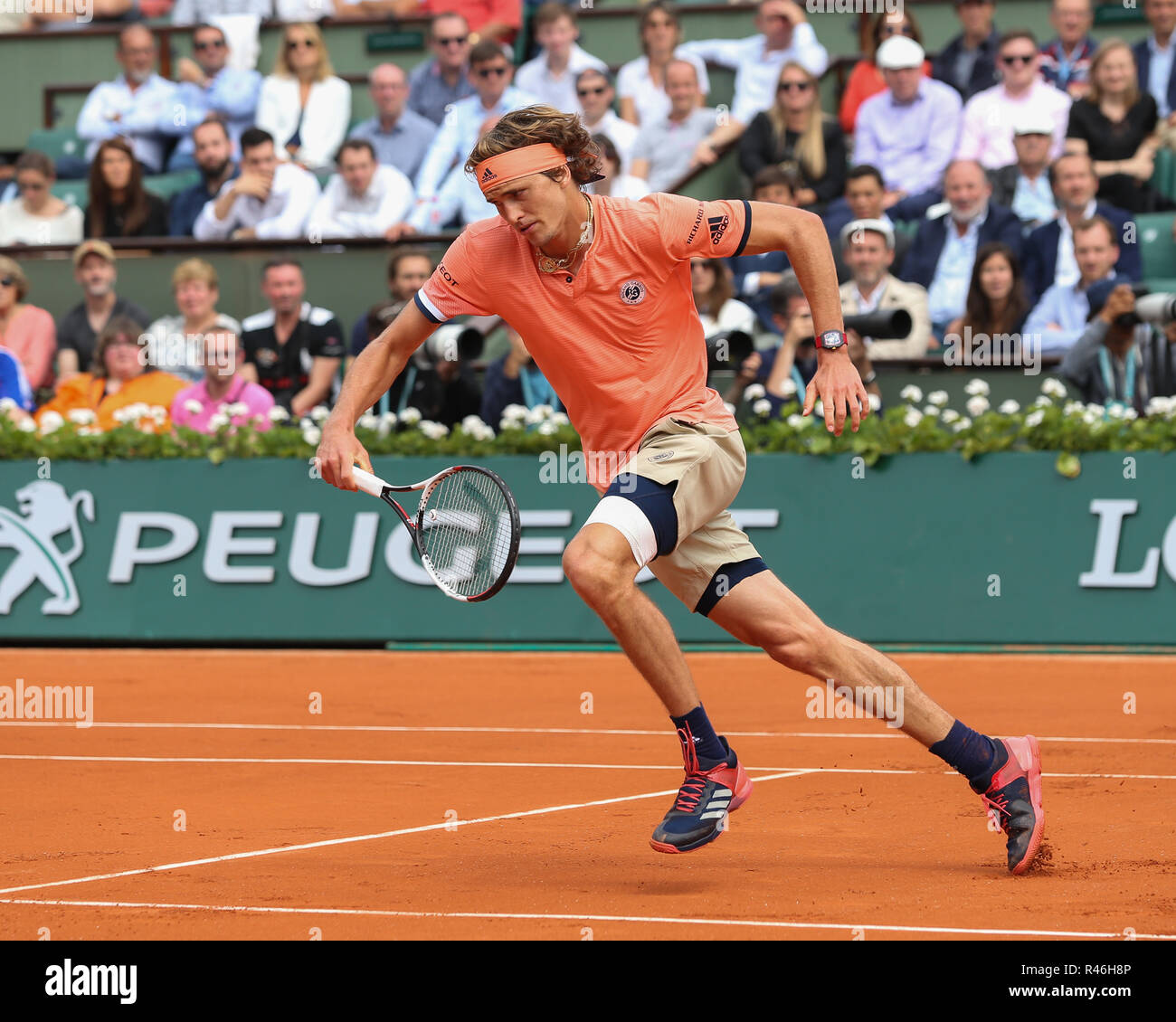 German tennis player Alexander Zverev running forward during French Open 2018 tennis tournament, Paris, France Stock Photo