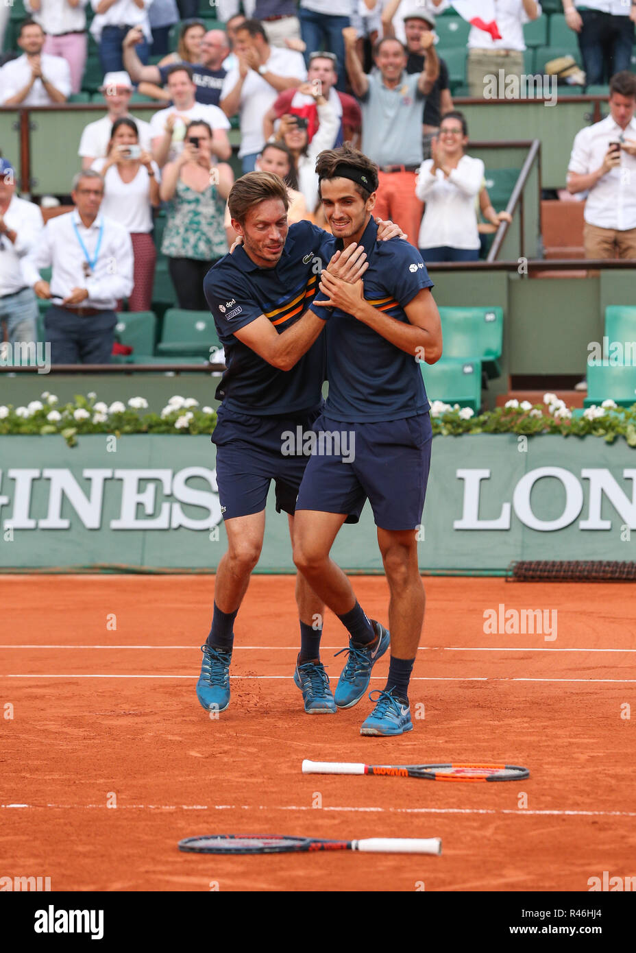 French tennis players Nicolas Mahut and Pierre-Hugues Herbert celebrating  victory at the French Open 2018,Paris, France Stock Photo - Alamy