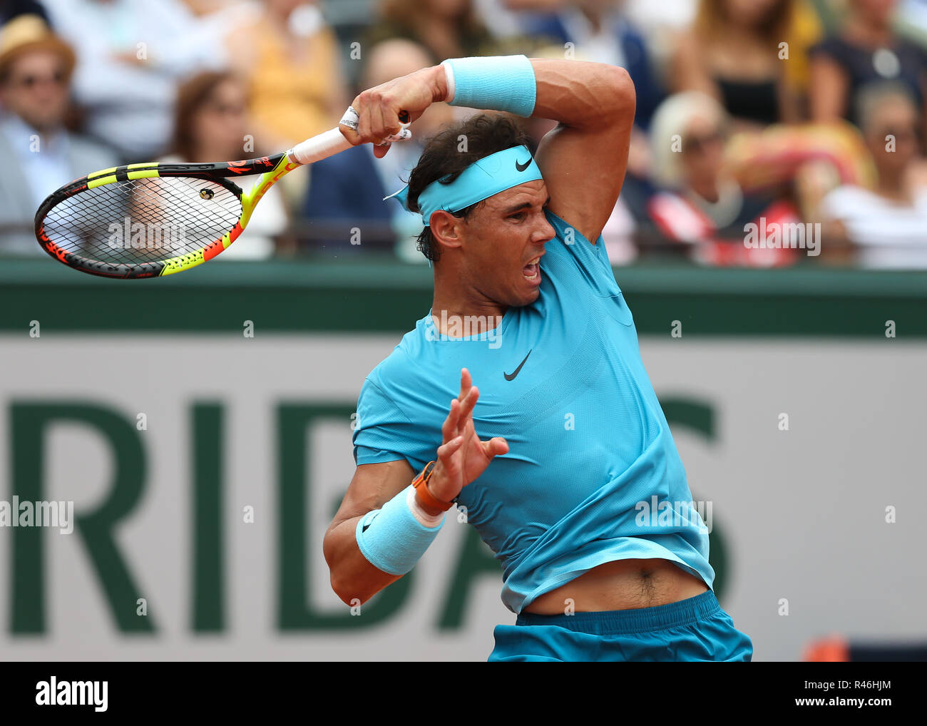 Spanish  tennis player Rafael Nadal  playing forehand shot at the French Open 2018, Paris, France Stock Photo