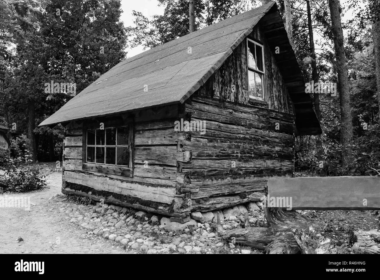 Abandoned old wooden house Cabin in the woods. View of old weathered ...