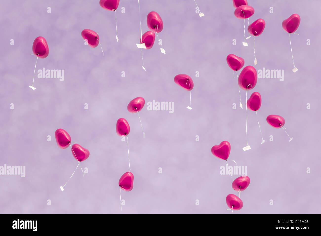 Rose heart balloons in the sky - symbol of love Stock Photo - Alamy