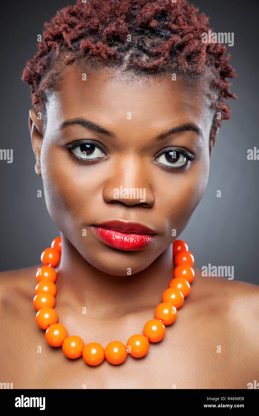 Black beauty with short spiky hair Stock Photo - Alamy