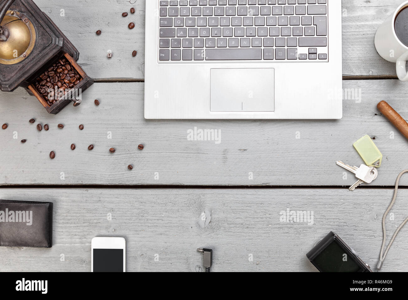 Workspace on a wooden table from above Stock Photo
