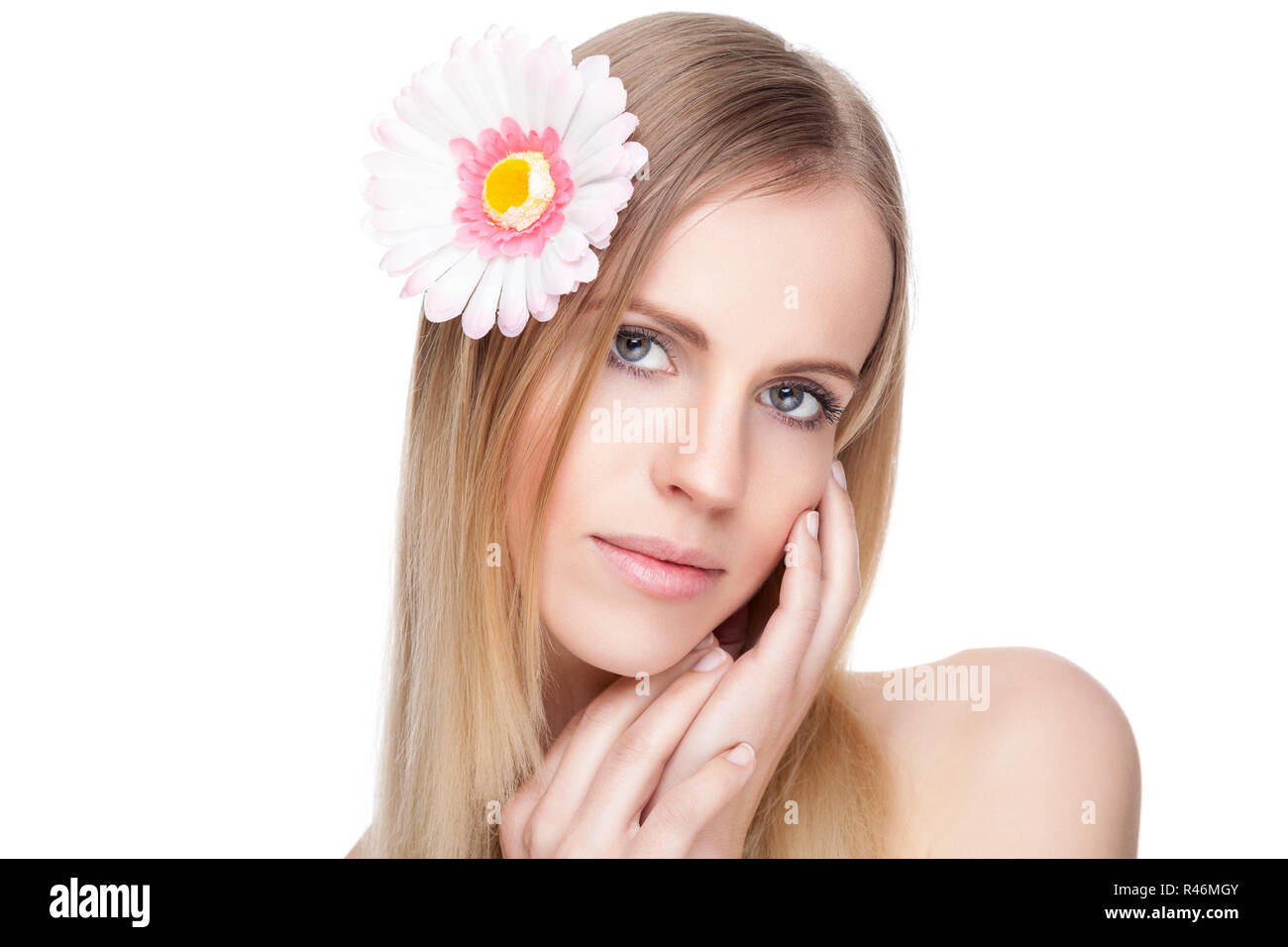 Beautiful woman with a flower in her hair Stock Photo - Alamy