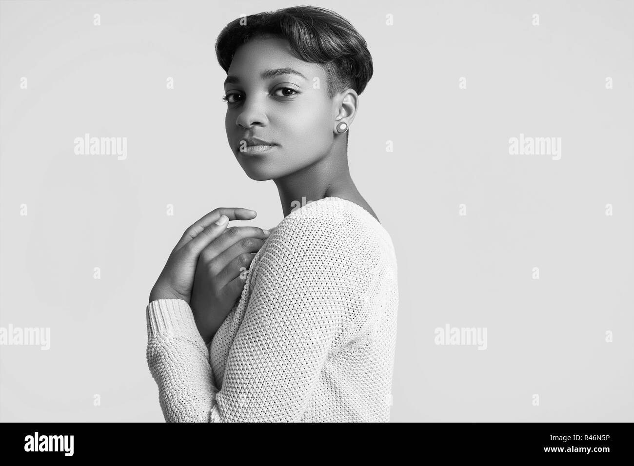Portrait Of Young Beautiful Hipster Black Girl With Short Hair In