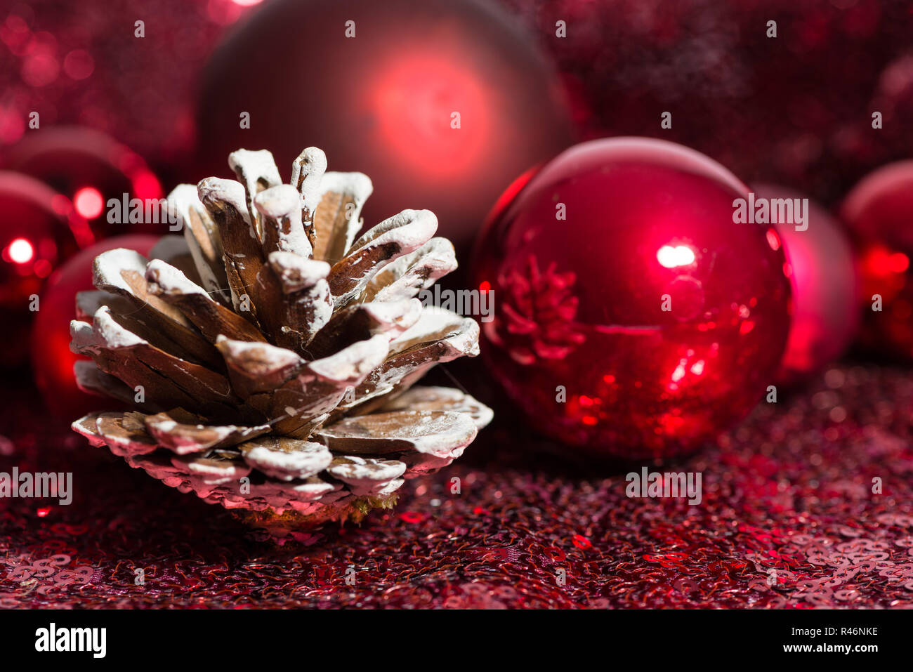 Red Christmas ornaments with pine cone Stock Photo - Alamy