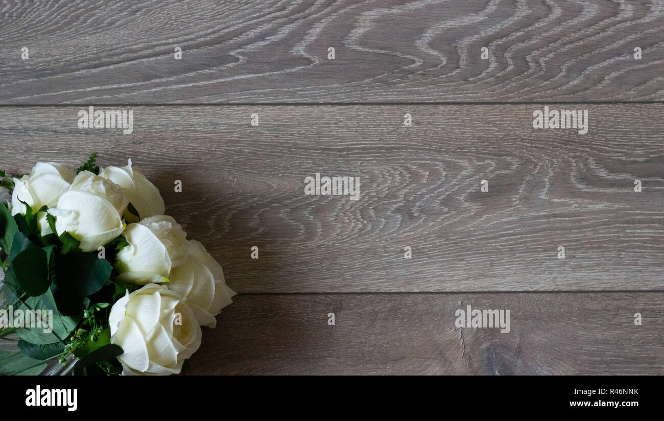 Rustic background with white roses on vintage planked wood with text ...