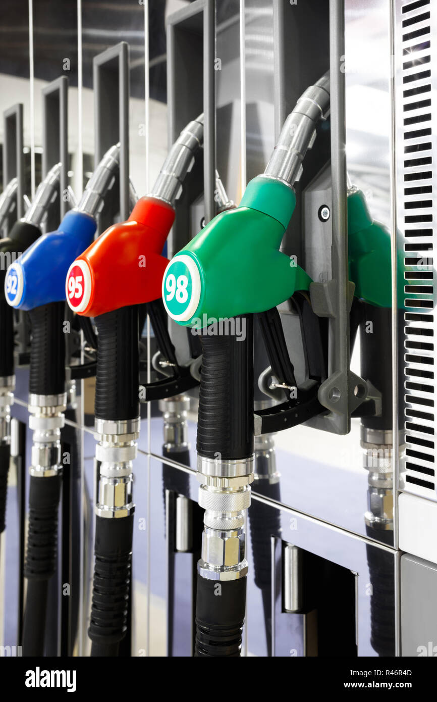 Blue Fuel Color Green red blue fuel pistols on fuel station Stock Photo - Alamy