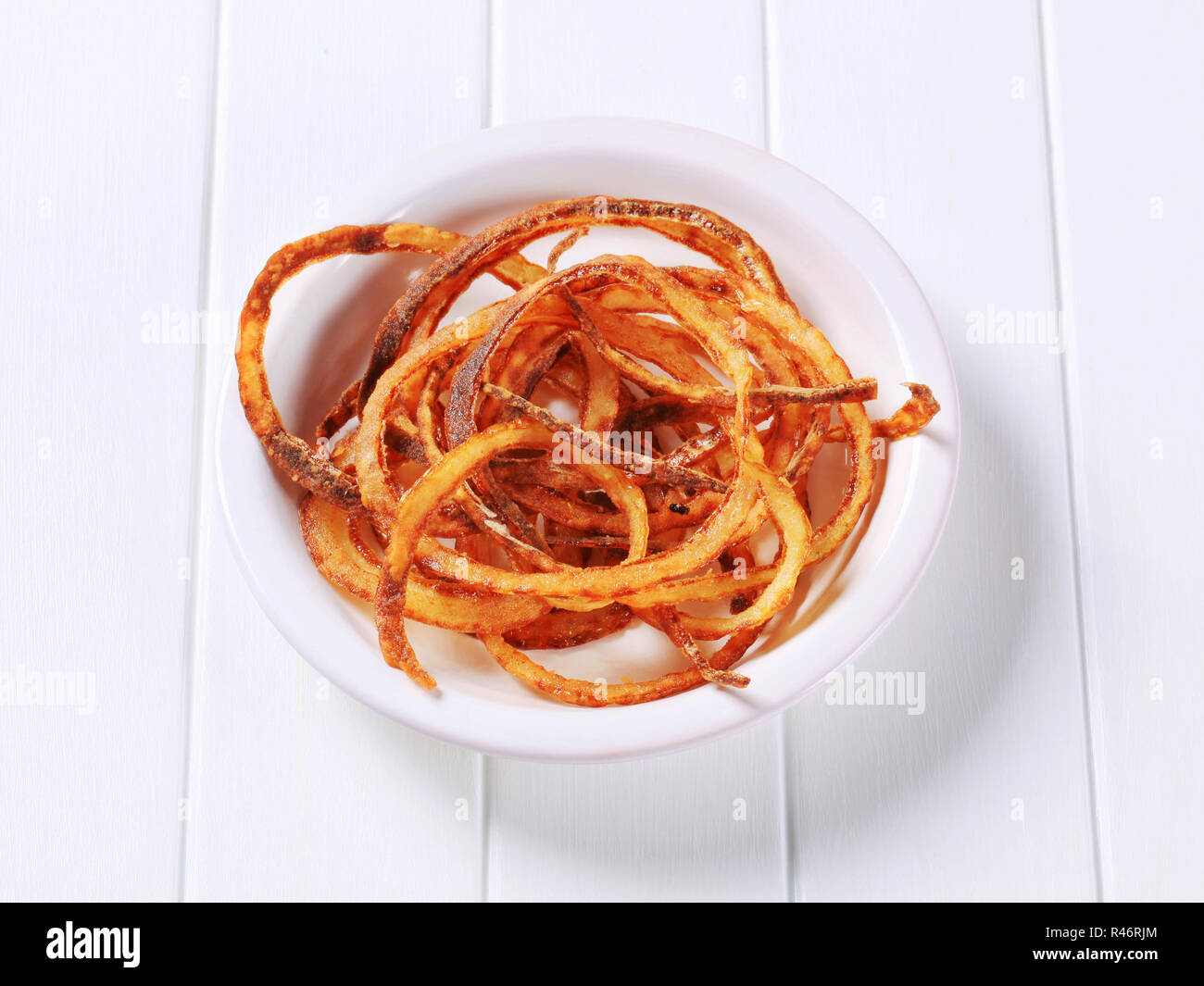 Panfried onion strings Stock Photo Alamy