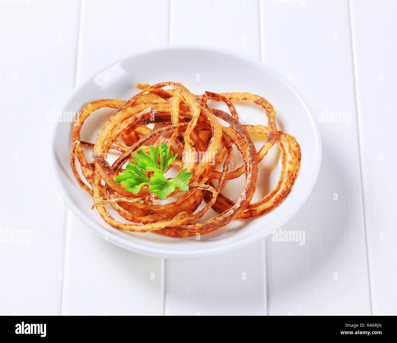 Fried onion strings hi-res stock photography and images - Alamy