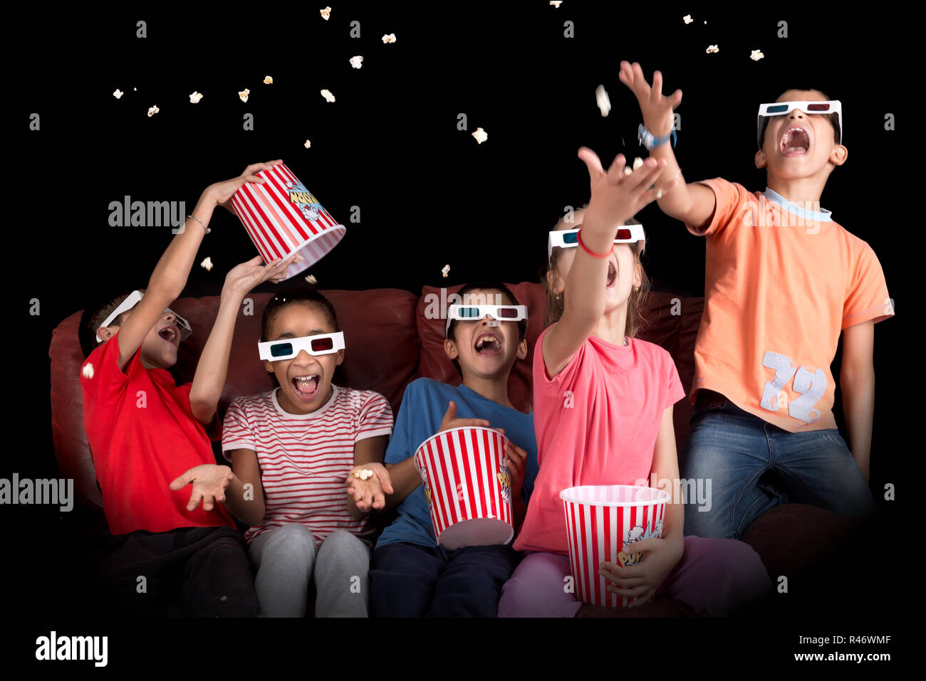 Kids in the movies Stock Photo