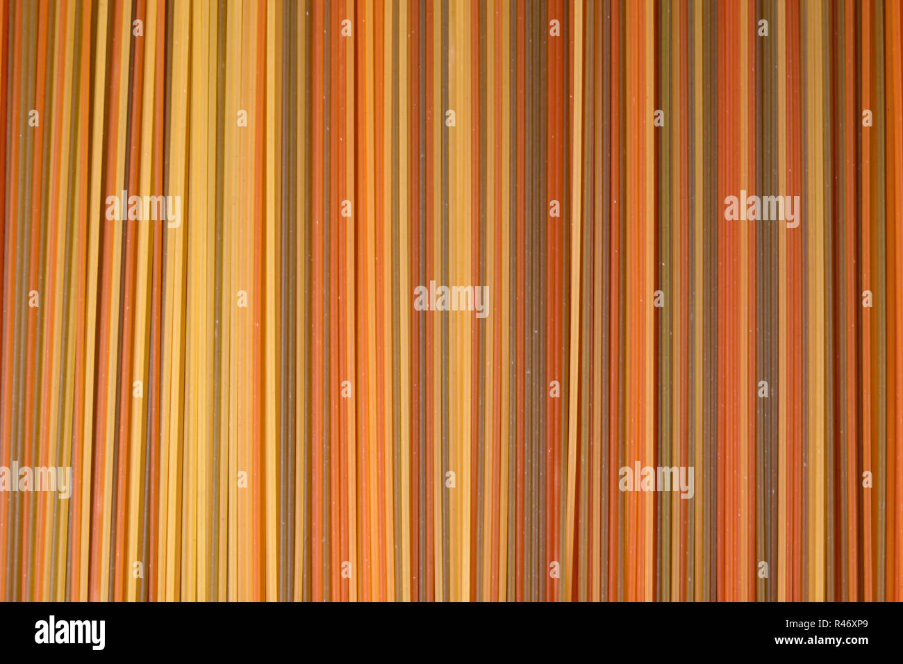 Colorful tricolore spaghetti pasta background Stock Photo - Alamy