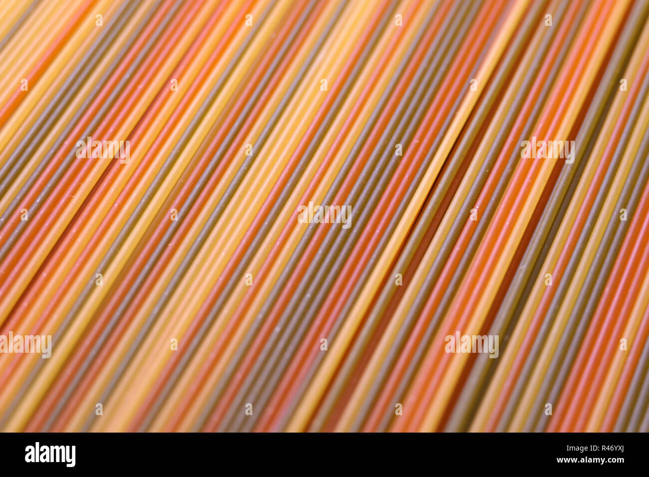 Colorful tricolore spaghetti pasta background Stock Photo - Alamy