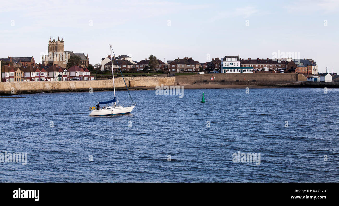 A boat heading out to sea at Hartlepool,England,UK Stock Photo