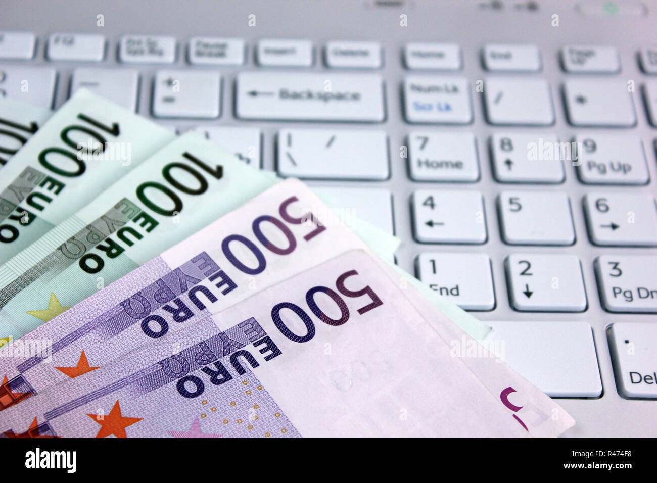 Euro and computer Stock Photo - Alamy