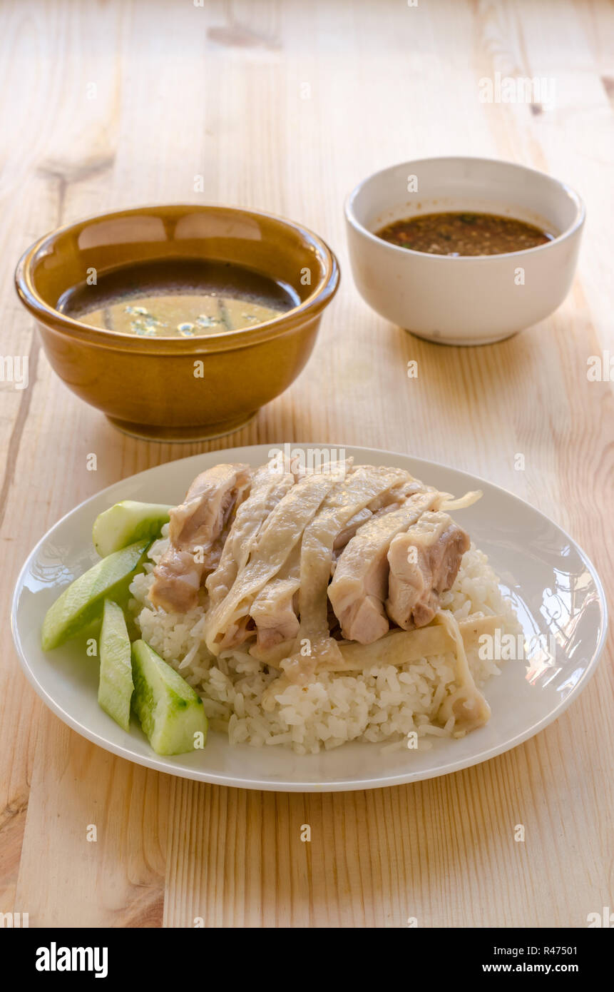 Hainanese chicken rice or rice cooked in chicken broth Stock Photo Alamy