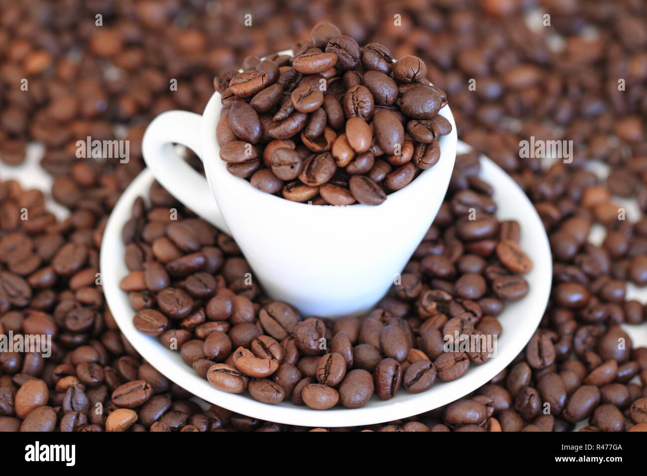 coffee beans in espresso cup Stock Photo