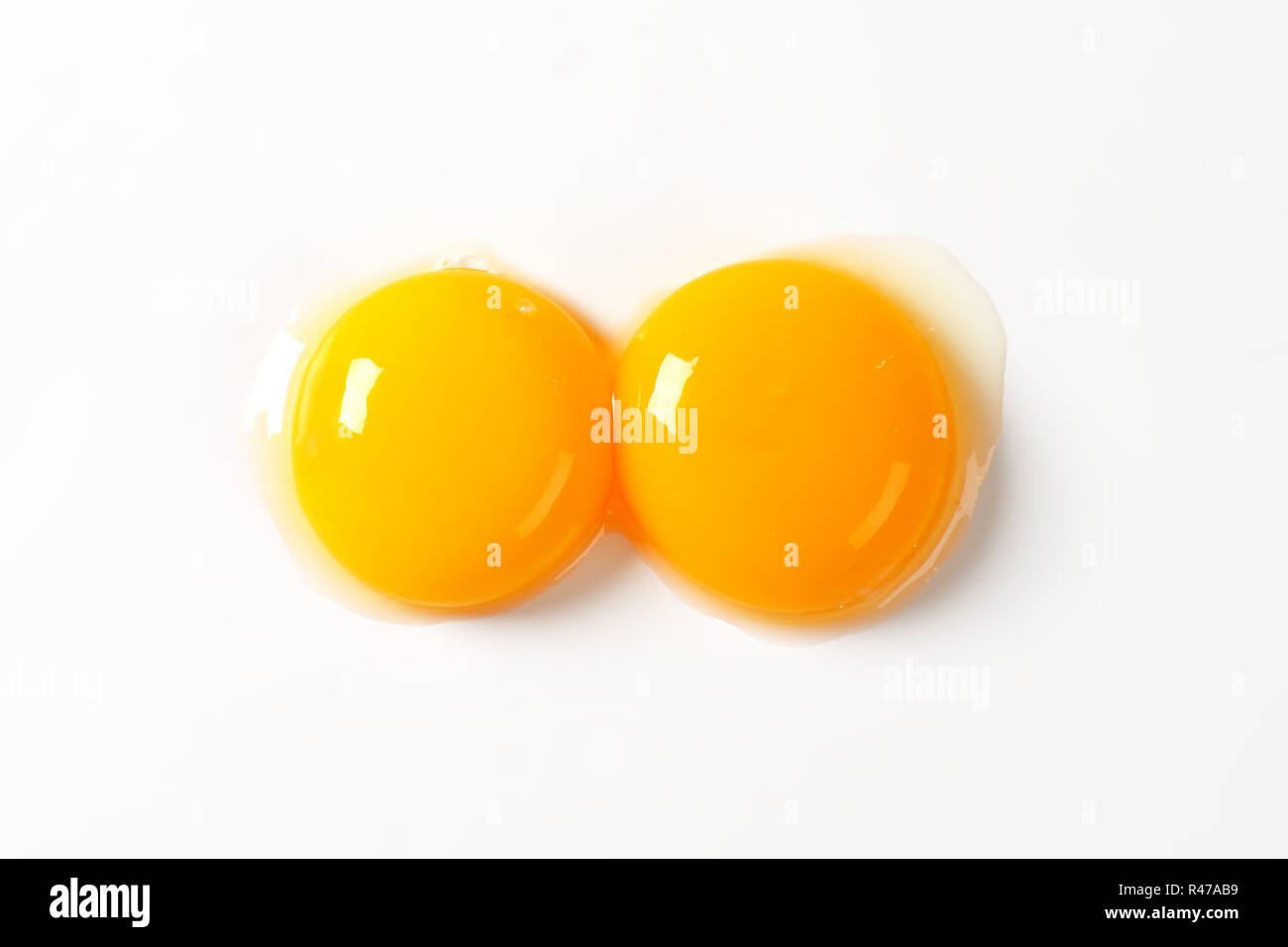 Raw egg yolks Stock Photo Alamy