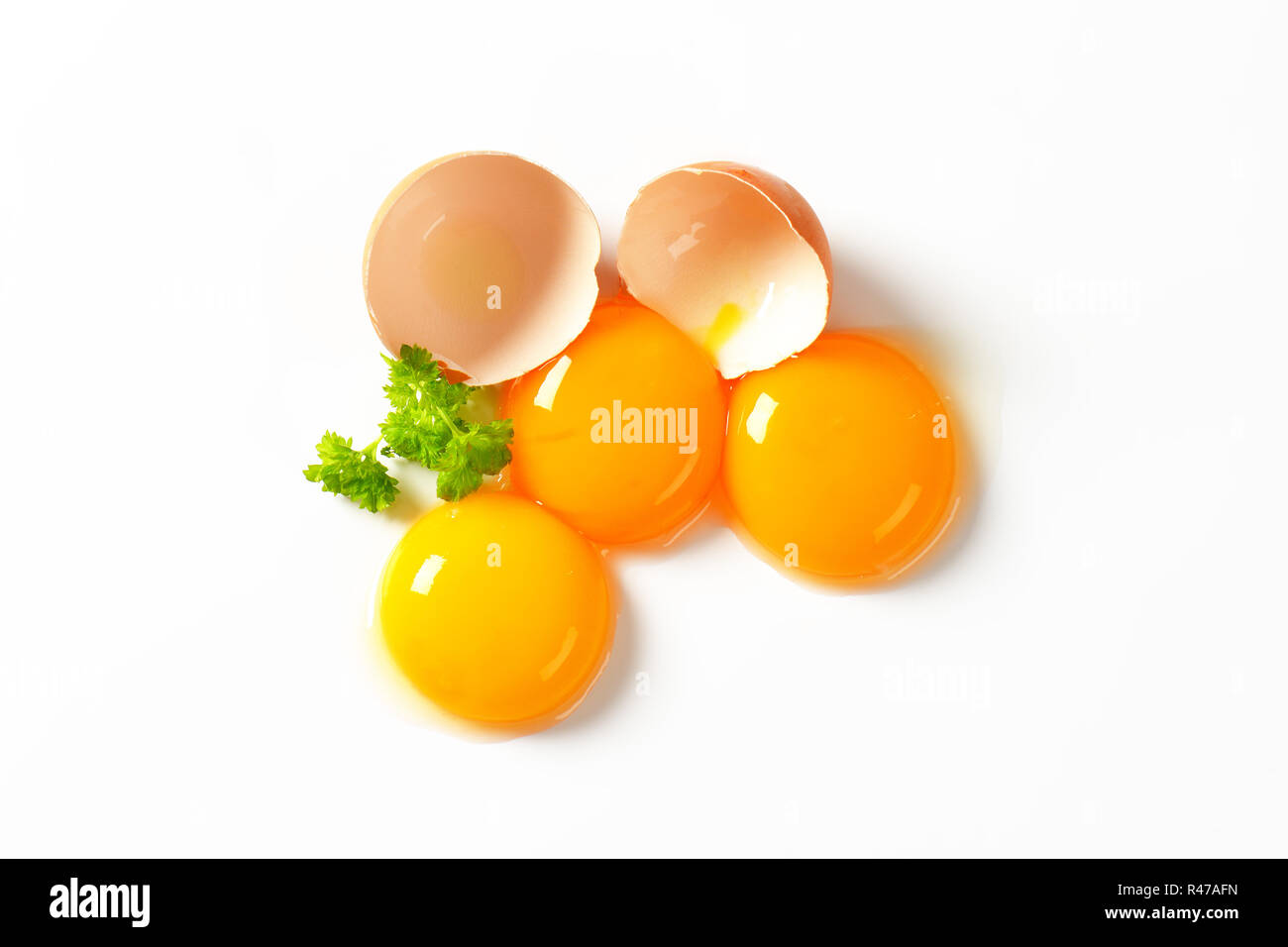 Raw egg yolks Stock Photo Alamy