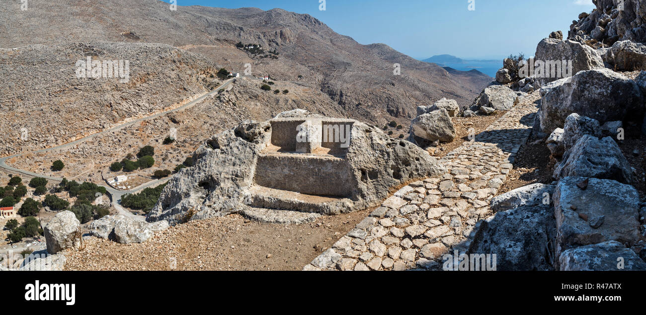 The carved thrones of Jupiter (Zeus) and Hera on stone. Ancient city at the  Greek island of Chalki, Aegean Sea Stock Photo - Alamy