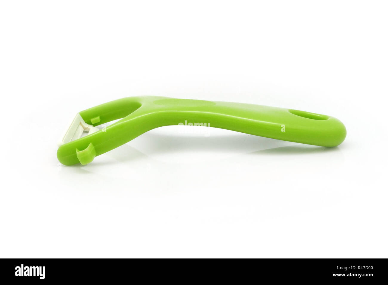 Green fruit skin peeler isolated Stock Photo Alamy