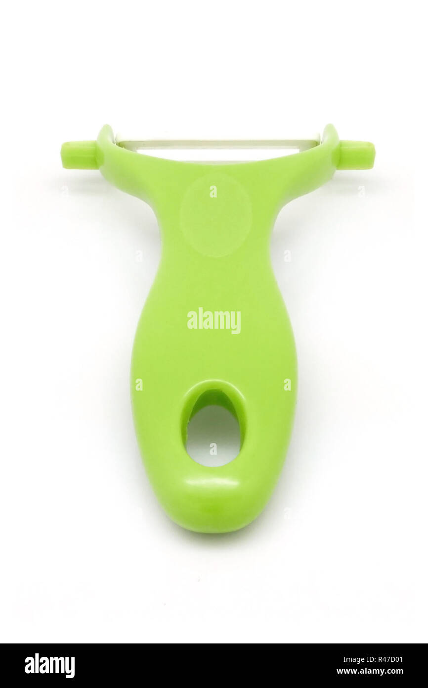 Green fruit skin peeler isolated Stock Photo Alamy