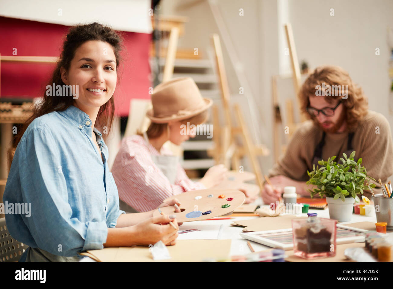 Student with palette Stock Photo - Alamy
