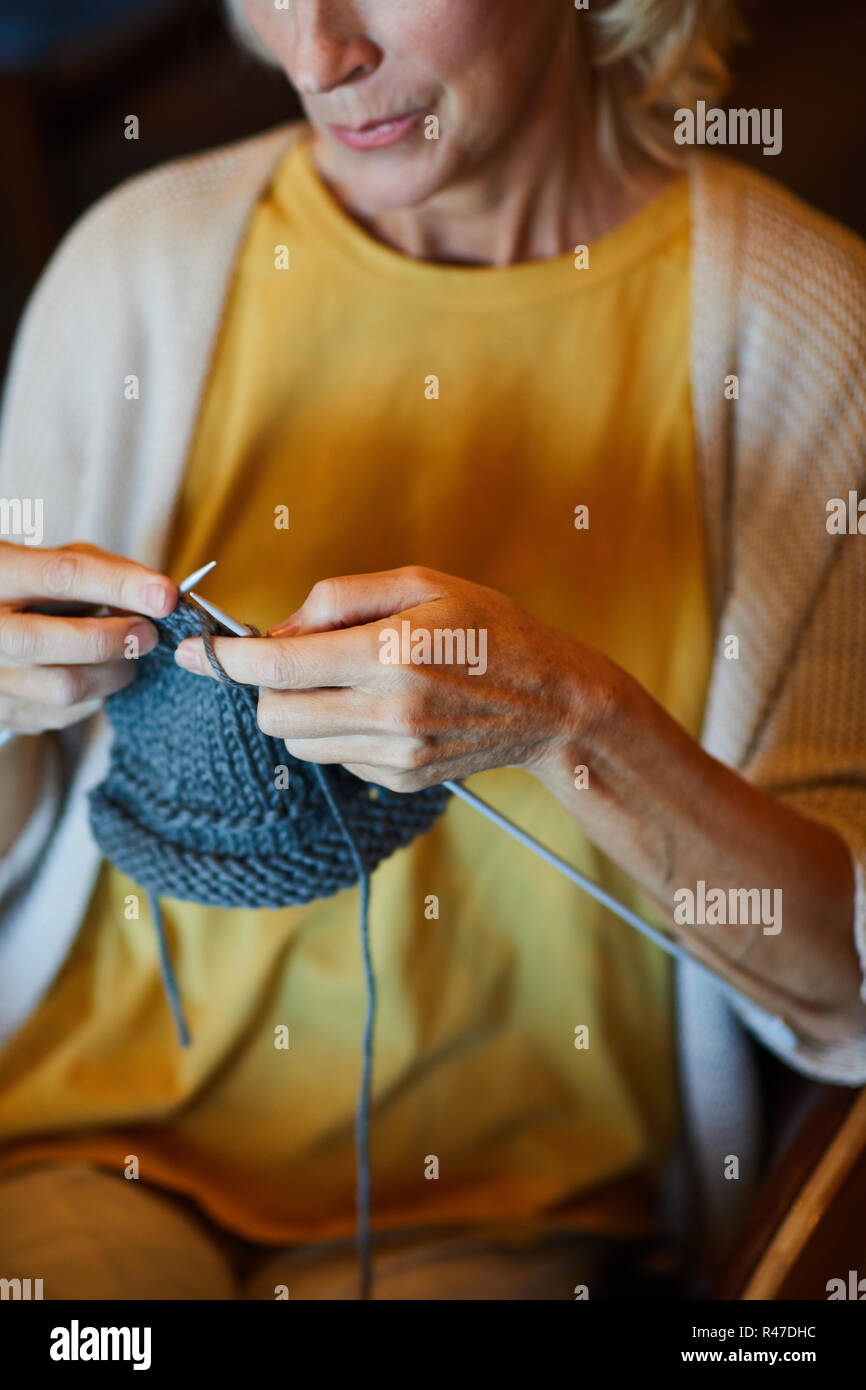 Knitting scarf Stock Photo
