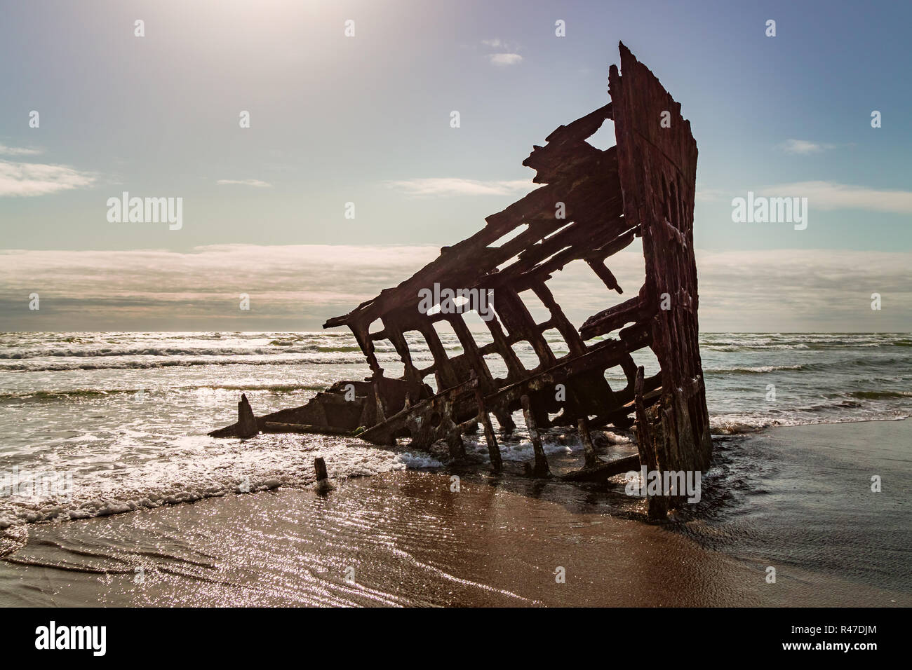 Peter Iredale shipwreck on a sunny day, Fort Stevens state park, Pacific coast, Oregon, USA. Stock Photo