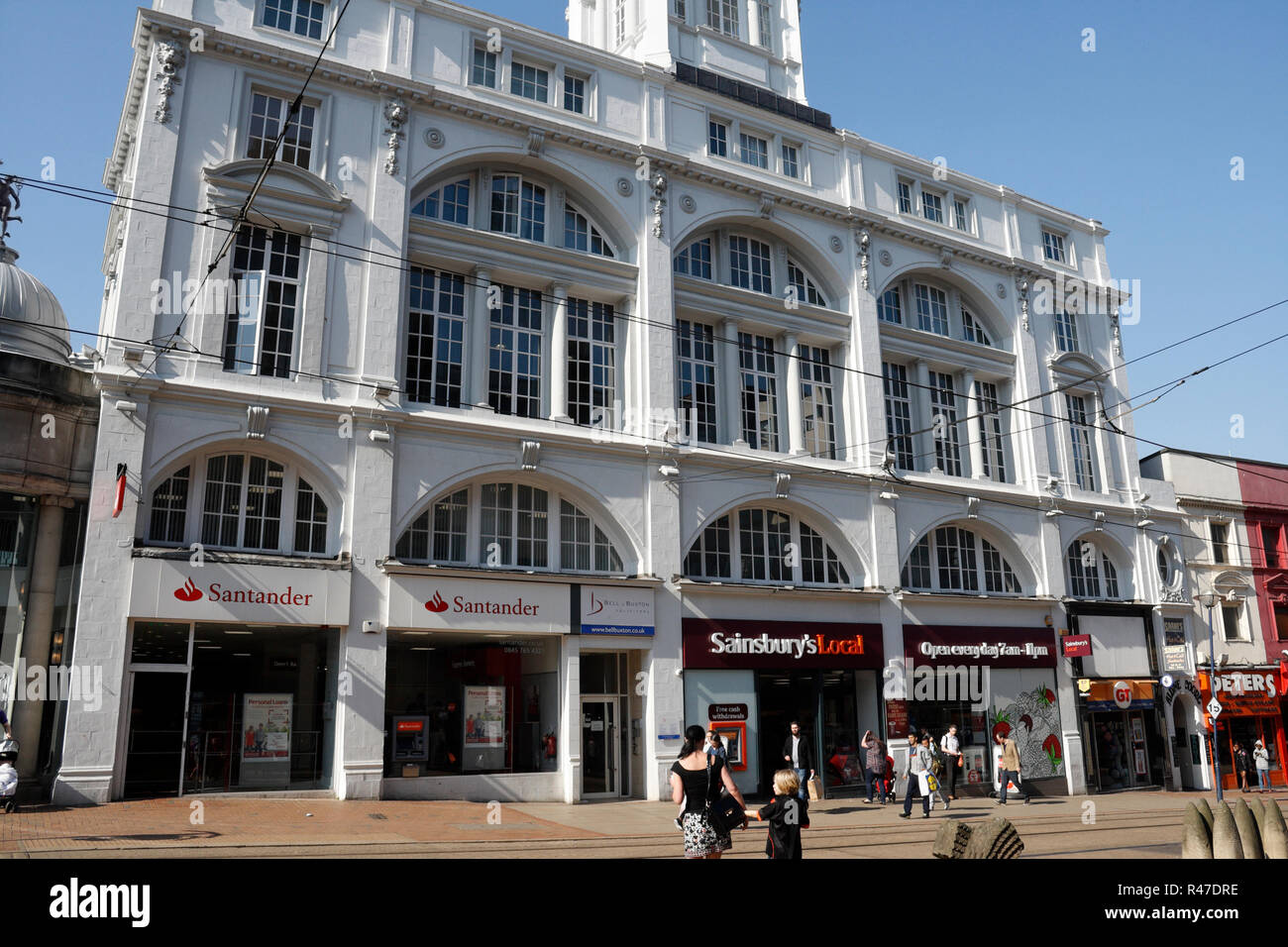 The frontage Star and Telegraph building on High Street, Sheffield city centre England, now Sainsbury's and Santander bank Iconic listed building Stock Photo