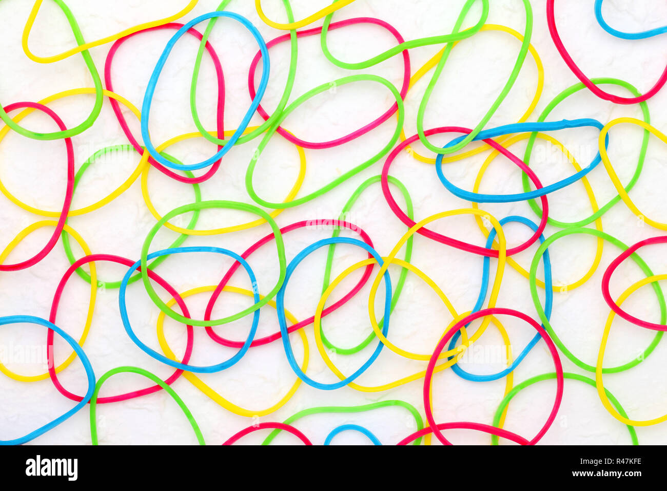 Colorful rubber bands background Stock Photo - Alamy