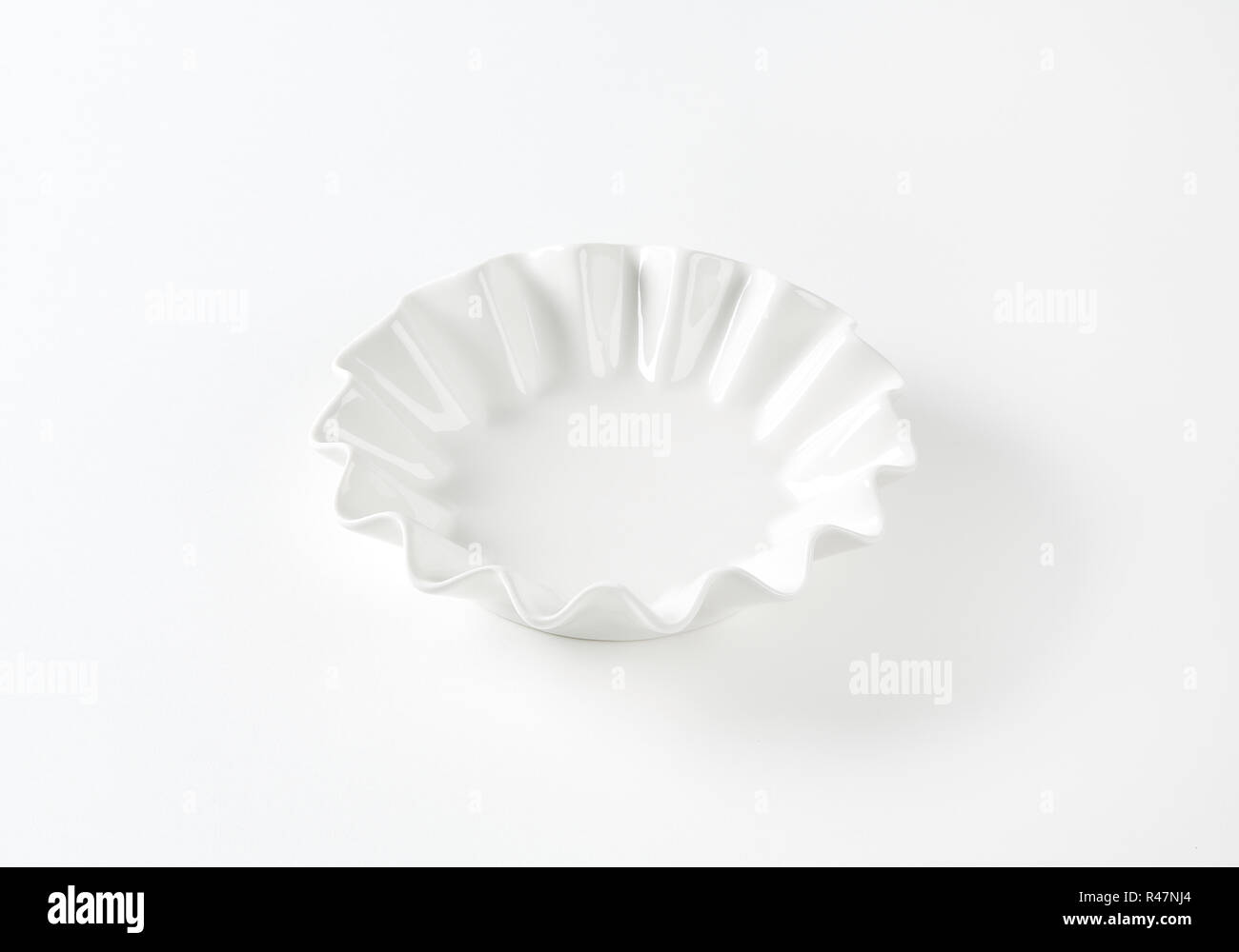 Fluted white bowl Stock Photo Alamy