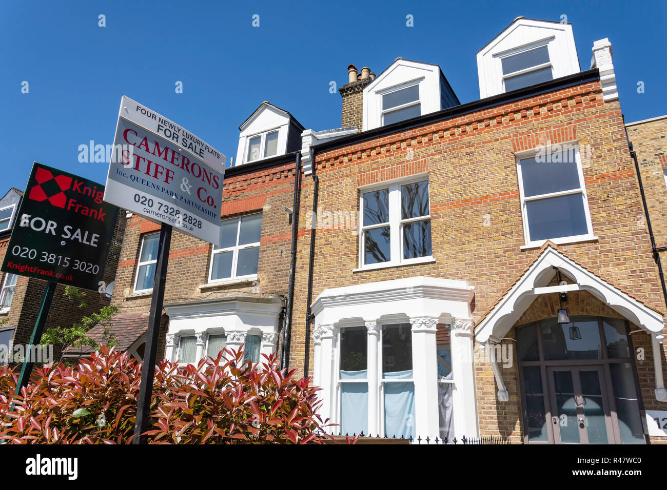 Flat for sale signs, Brondesbury Road, Queen's Park, Borough of Brent, Greater London, England, United Kingdom Stock Photo