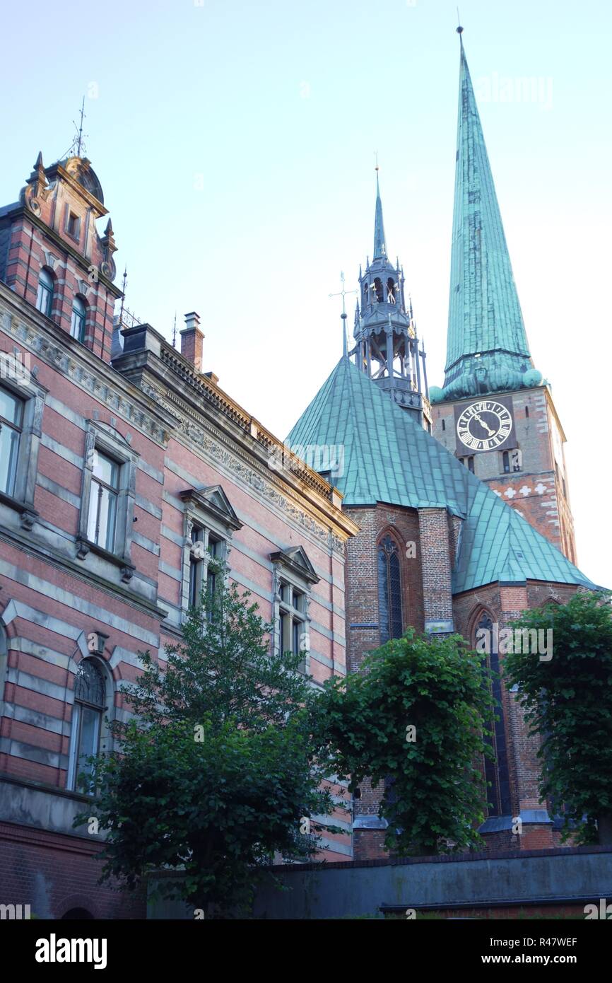 view of the towers of st. jacob's church in the old town island of lÃ¼beck Stock Photo