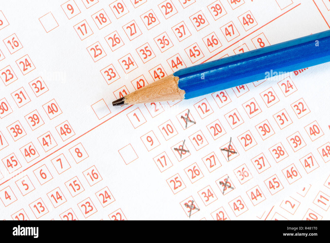 Marking numbers on lottery ticket Stock Photo Alamy
