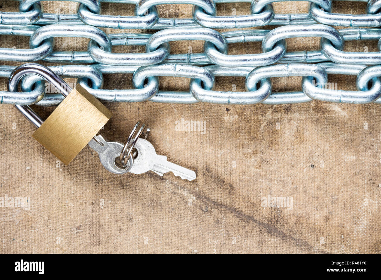 Padlock and chain on the dirty background Stock Photo