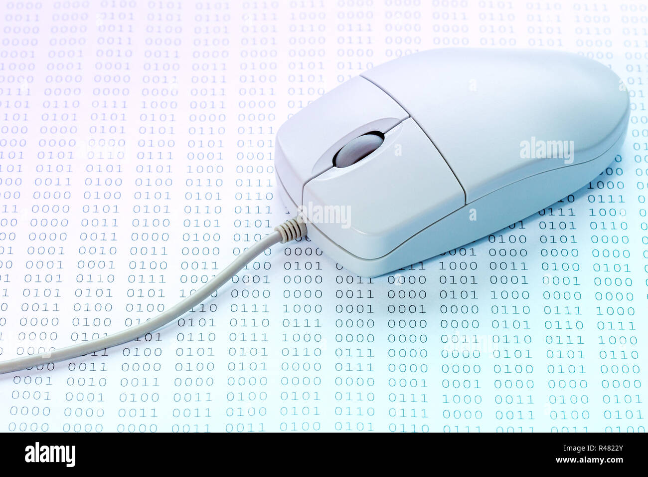 Binary code and computer mouse Stock Photo - Alamy