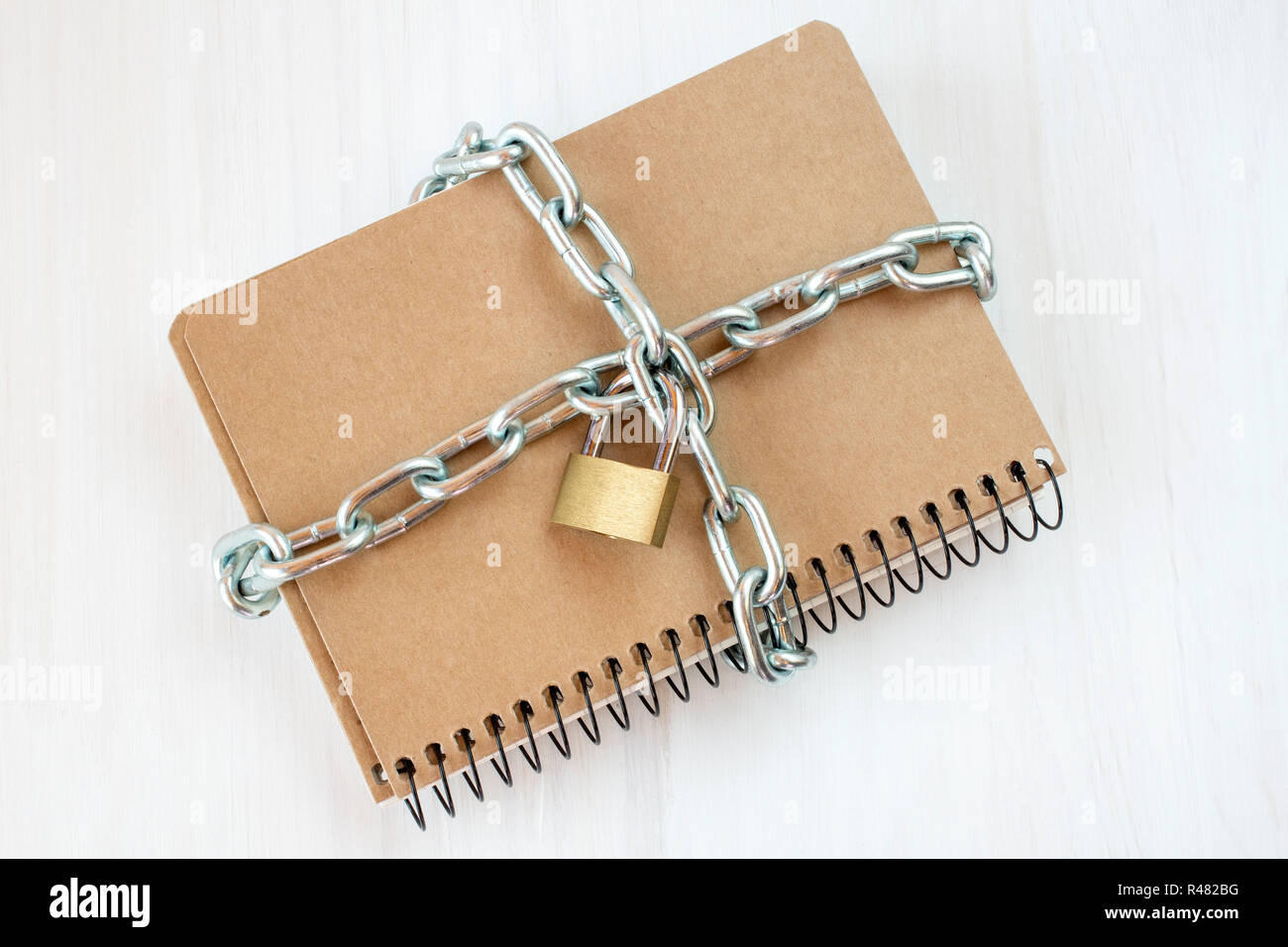 Censorship concept with book and chains Stock Photo