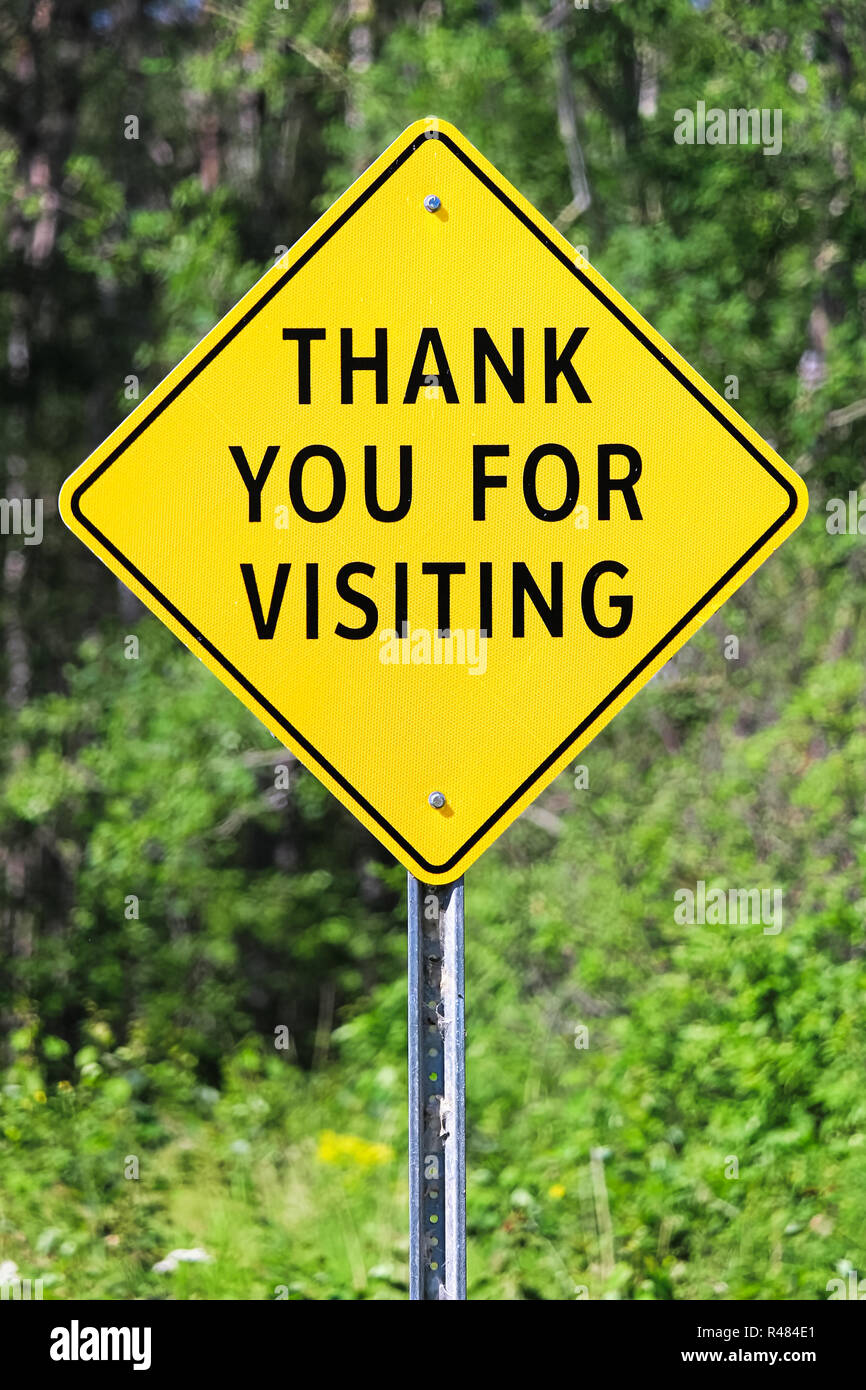 Closeup of a thank you for visiting sign. Stock Photo