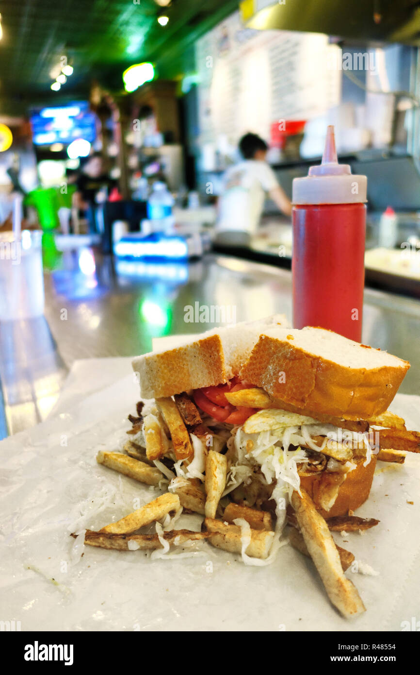 A sandwich with french fries and cole slaw on it at the famous Primanti Brothers in Pittsburgh, Pennsylvania, USA Stock Photo
