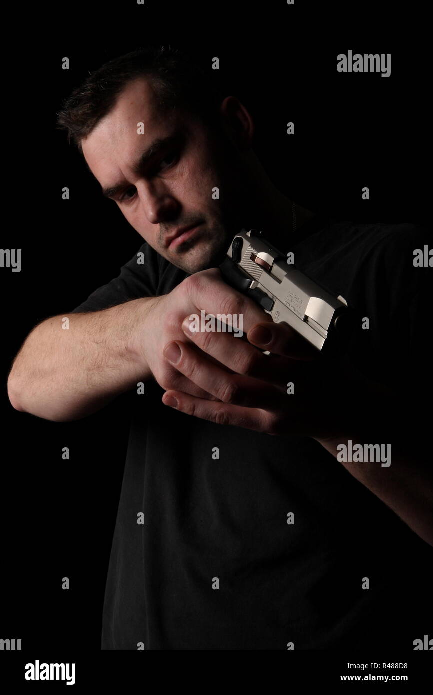 man with pistol Stock Photo
