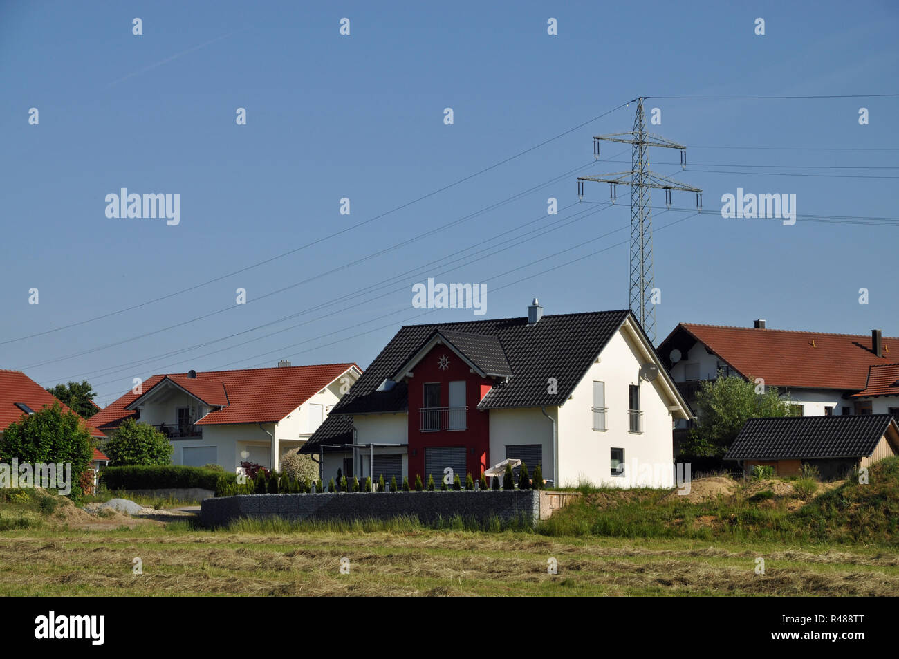 high voltage power line in residential area Stock Photo