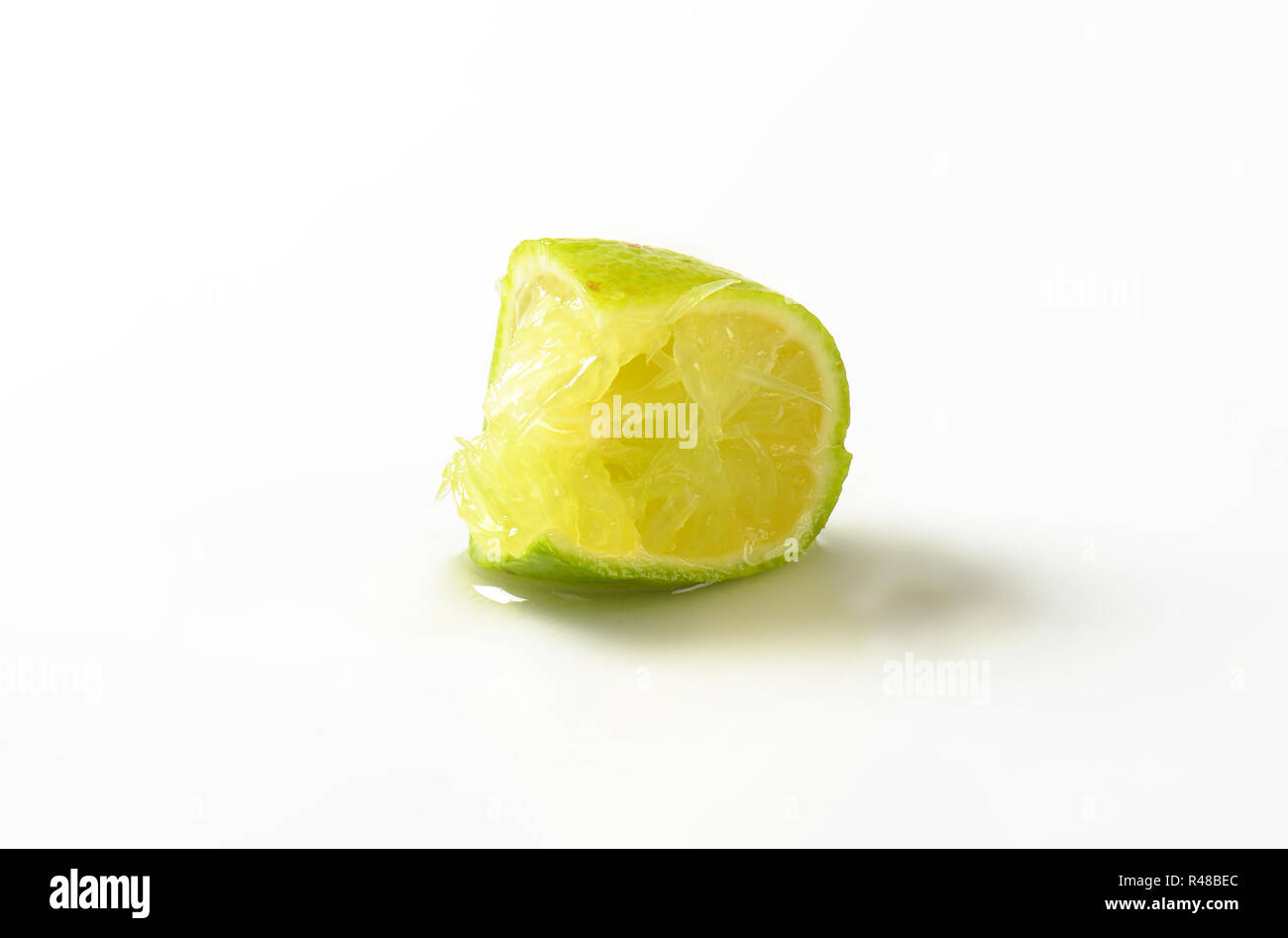Squeezed lime fruit Stock Photo Alamy